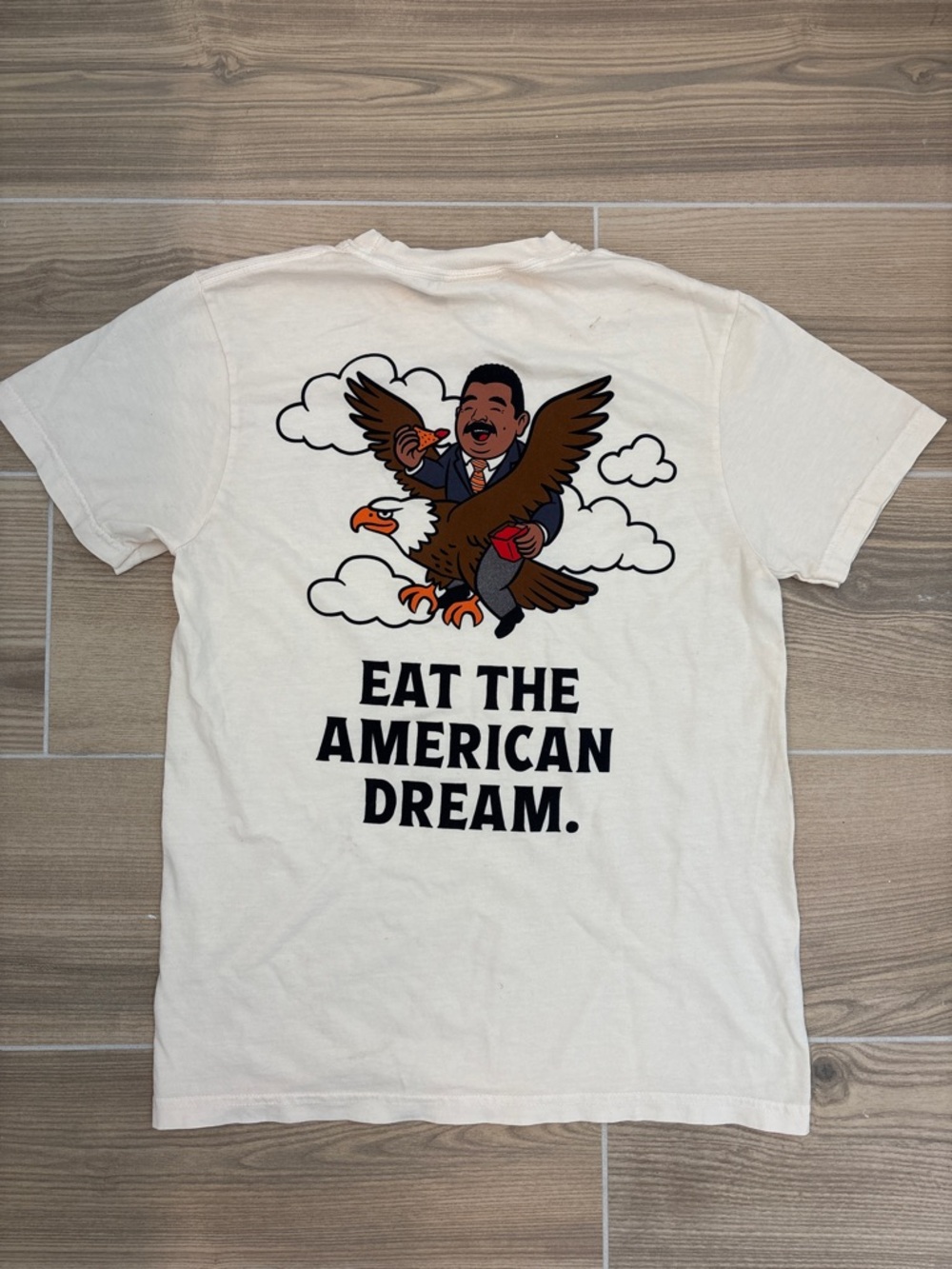 Jimmy Kimmel’s Guillermo’s Salsa Cream Graphic Tee with Eagle and Slogan